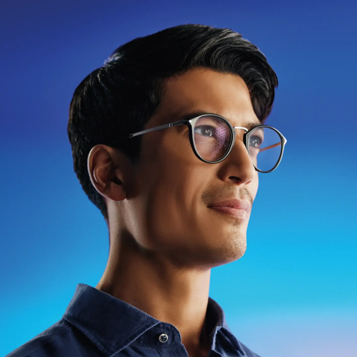 Man wearing round framed eyeglasses